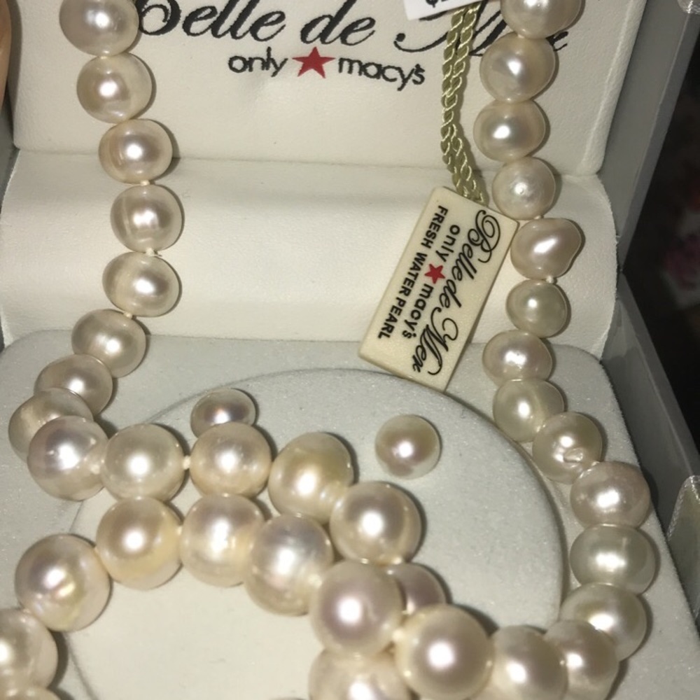 Brand new pearl necklace and earring set.